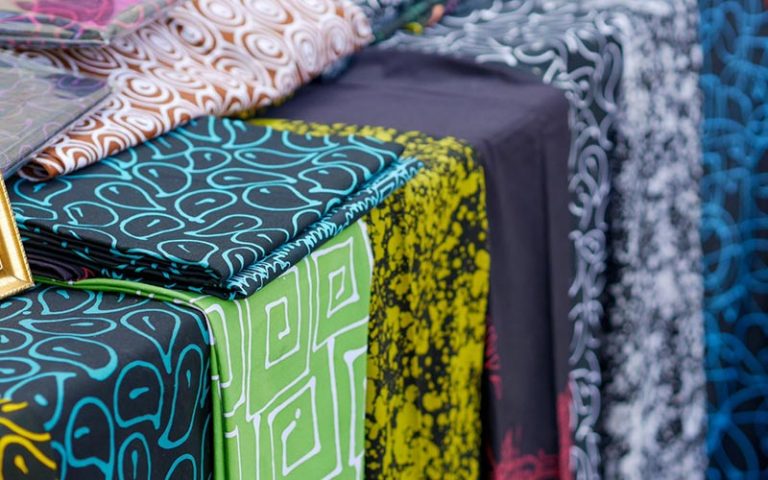 Different pieces of unique ankara prints with african patterns all well folded for display